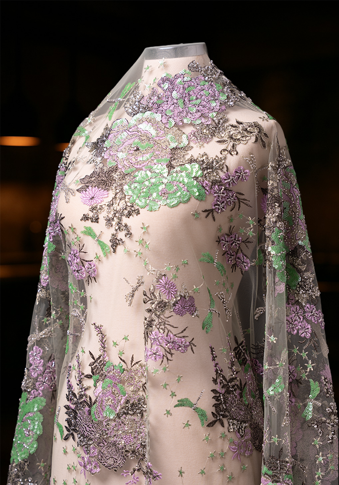 DN.2039 Couture fabric made of tulle embellished with three-dimensional spring blossoms and colorful sequins.