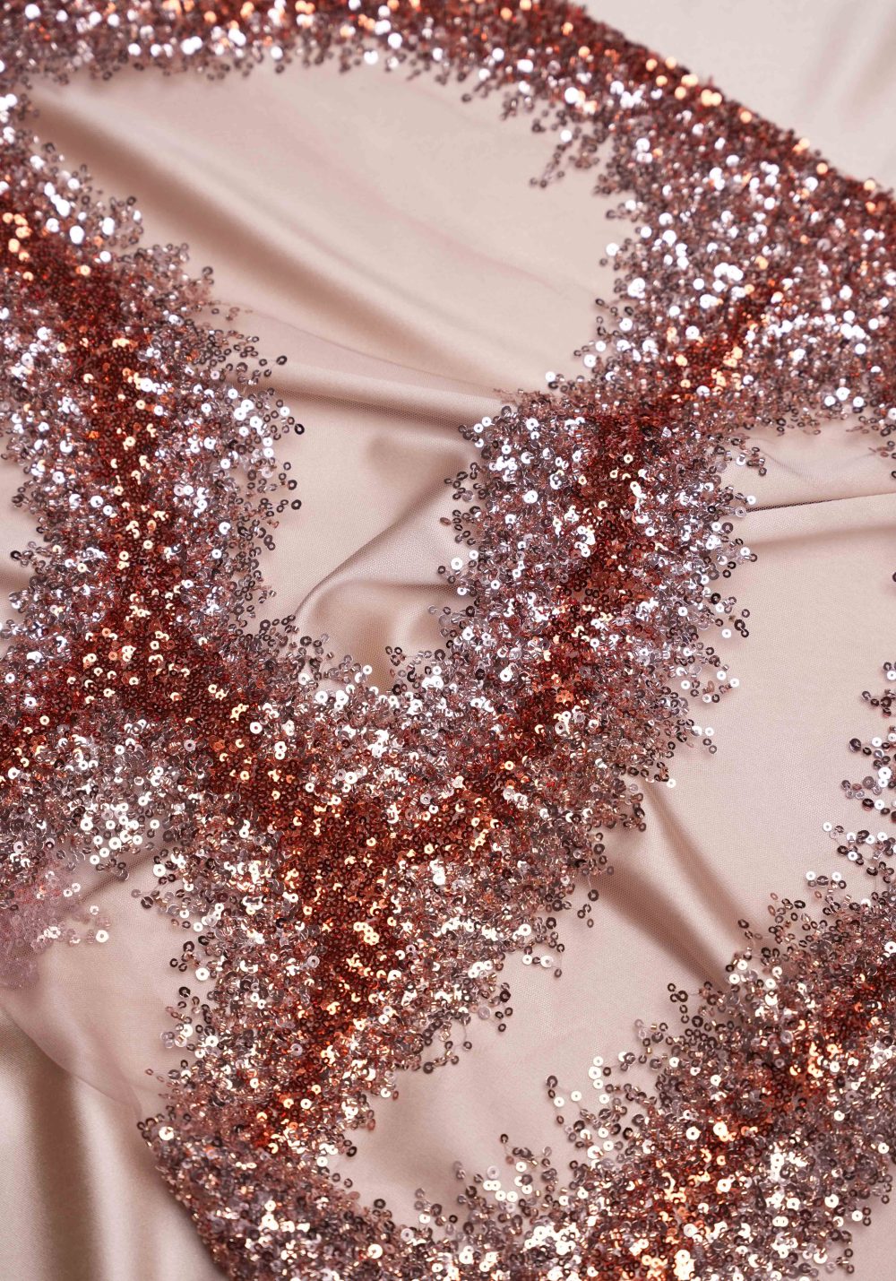DN.2040 - Couture fabric featuring rich abstract embroidery of glittering sequins in a wave pattern.