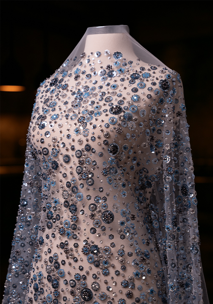 ID 1334 - Luxury Couture Fabric Tulle Embroidered with Sequins Featuring Delicate Cherry Blossom Patterns.