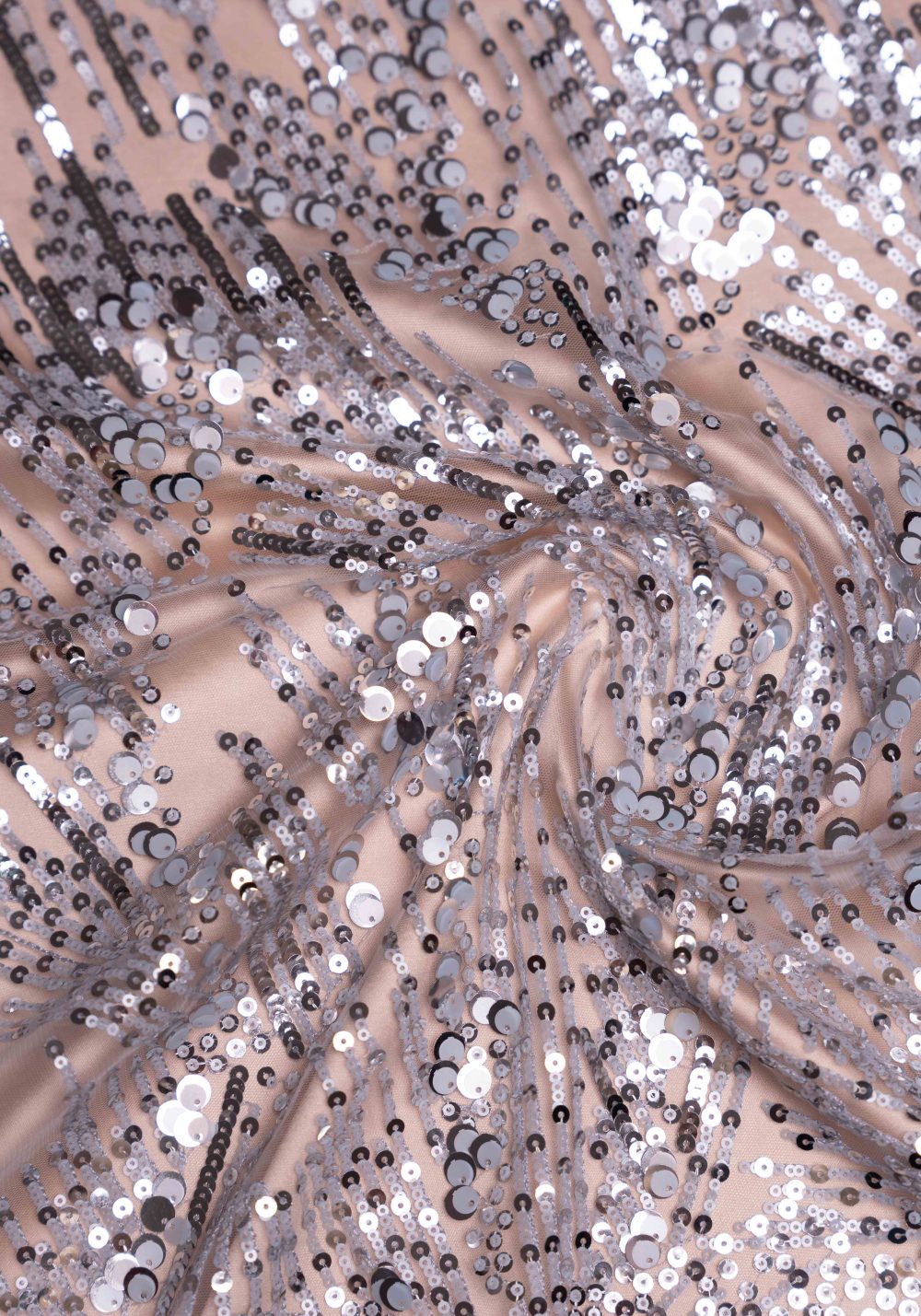 ID 2097 -  couture fabric embroidered with sequins in sunray lines and geometric swirl patterns.